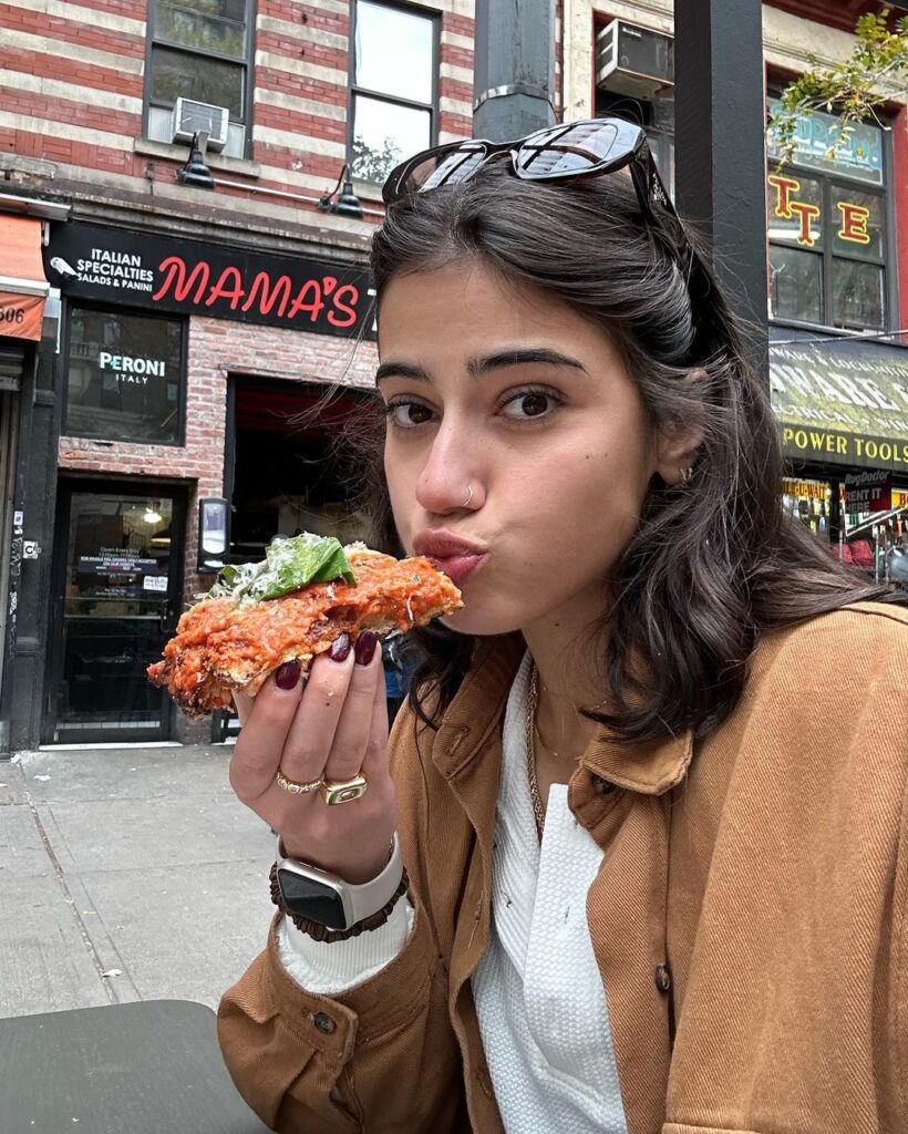 Sara Saffari eating Pizza
